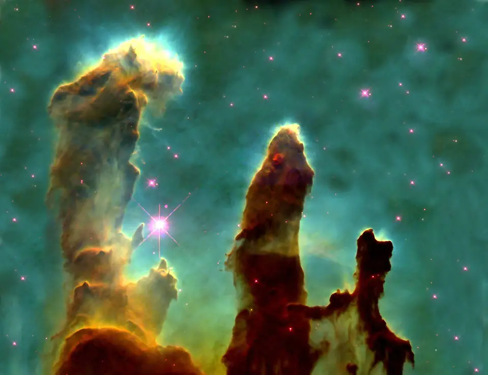 The Pillars of Creation in the Eagle Nebula, photographed by the Hubble telescope